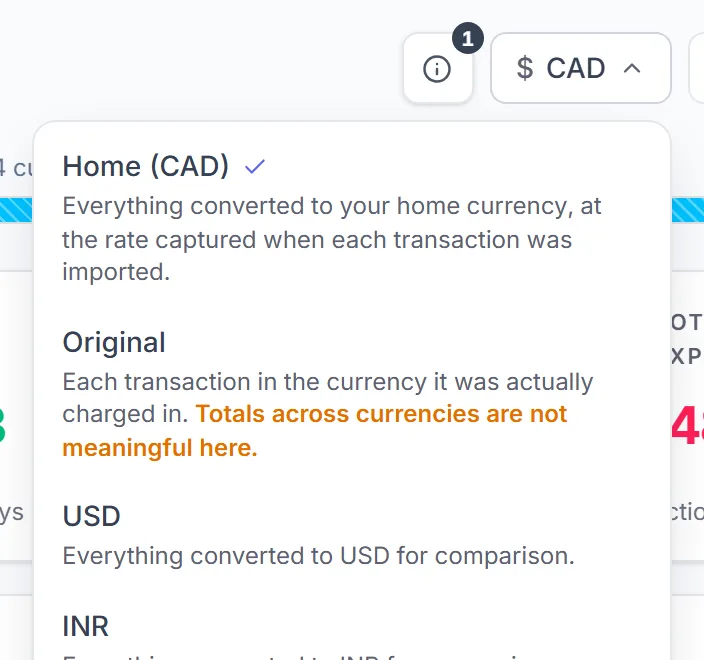The Currency Lens menu open: home, original, or a currency you pick